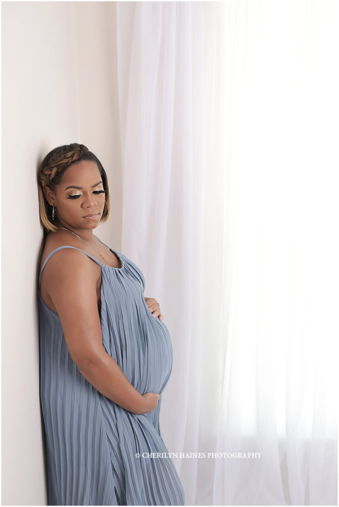 light and airy maternity portrait session in baton rouge, louisiana with cherilyn haines photography; pregnant mama wearing flowing light blue dress