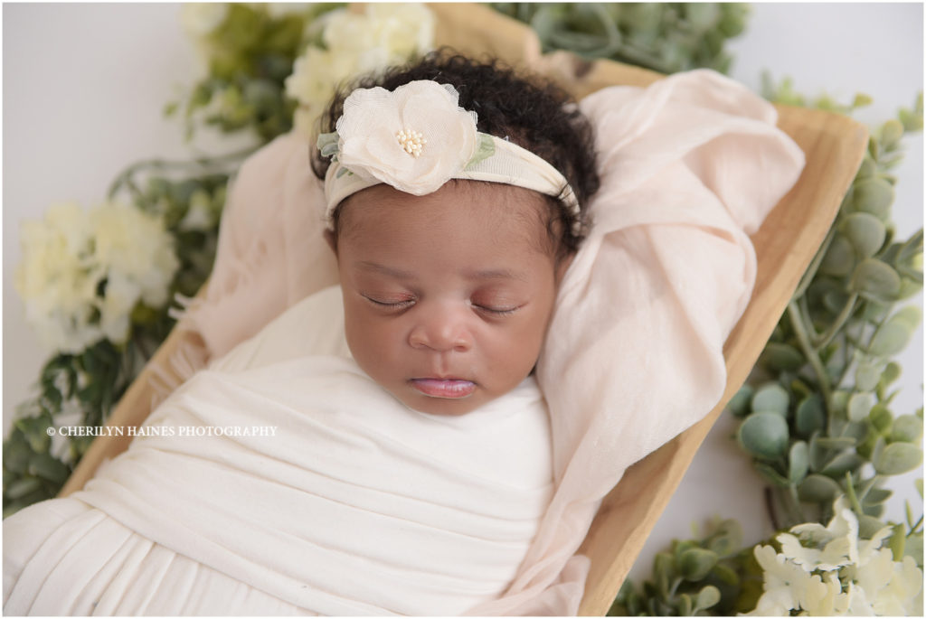 1 month old newborn baby girl photographed in Baton Rouge, Louisiana with Cherilyn Haines Photography