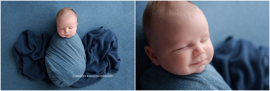 smiling newborn portrait by cherilyn haines in louisiana; baby boy photographed on blued blanket