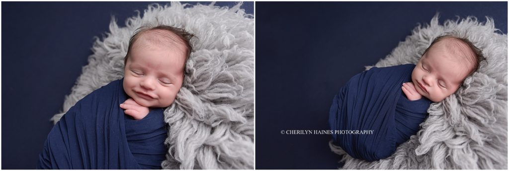 newborn photography session in baton rouge, louisiana with baby smiling