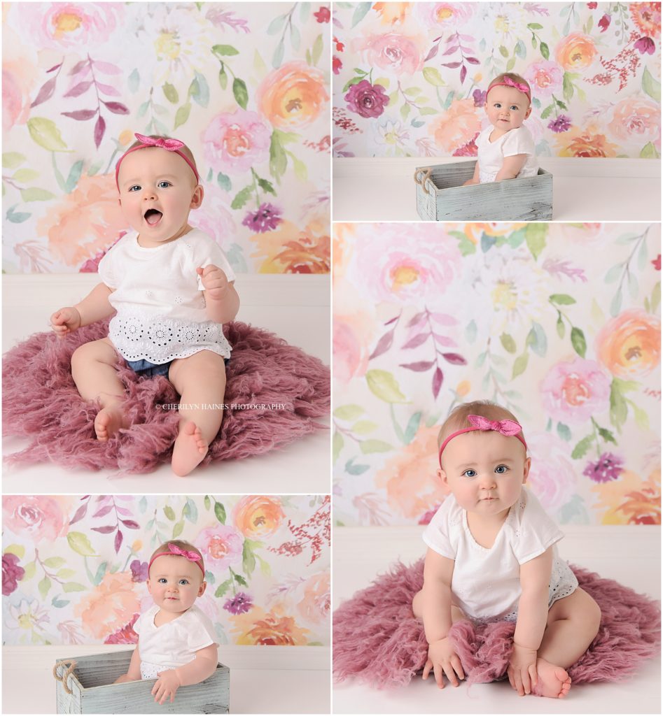 6 month portraits on floral backdrop