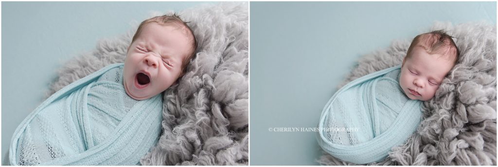 yawning newborn baby boy