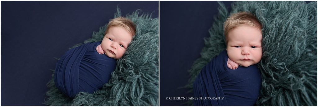 newborn session in baton rouge louisiana with 15 day old baby boy swaddled in navy