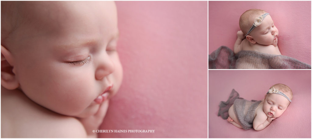 macro shots of newborn baby sleeping on pink blanket