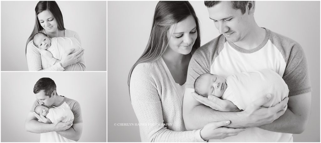 mom and dad with newborn baby boy