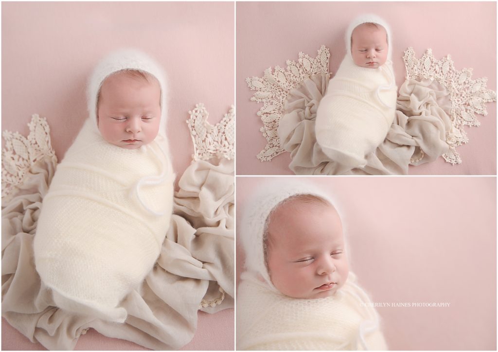 17 day old newborn baby girl laying on pink blanket with vintage look