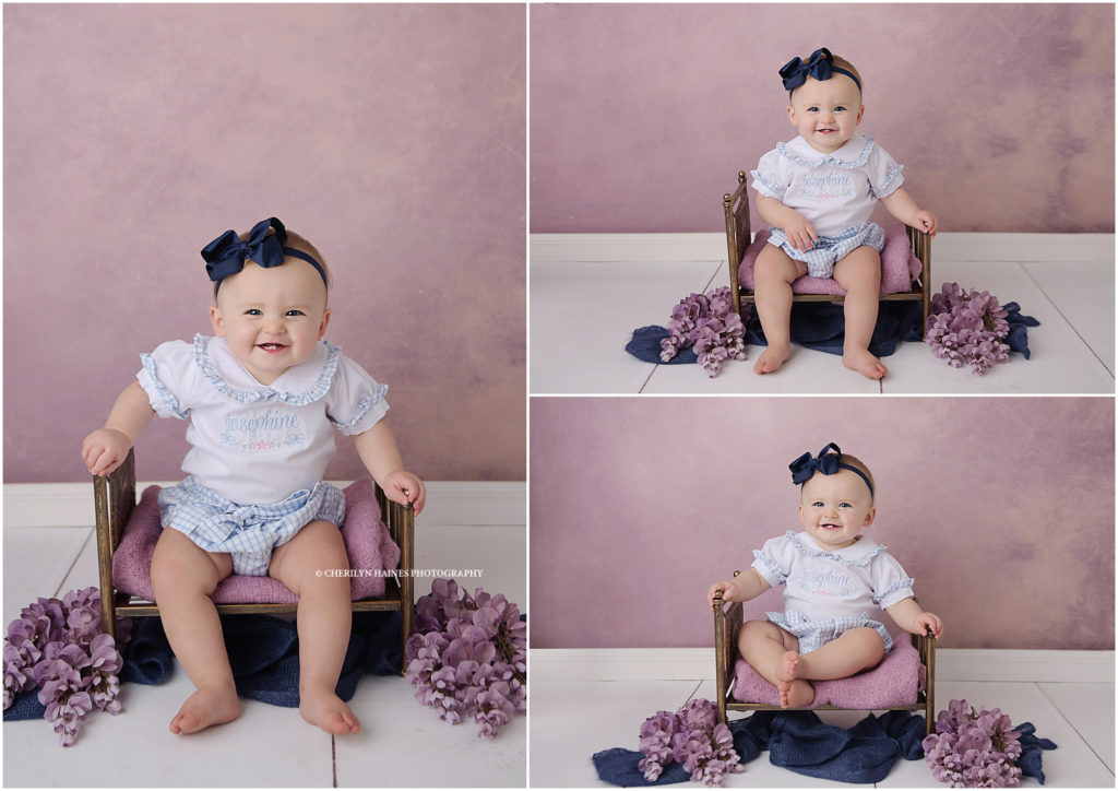 baton rouge, louisiana baby plan photographer; 1 year old baby girl photographed sitting on tiny iron bed with purple flowers