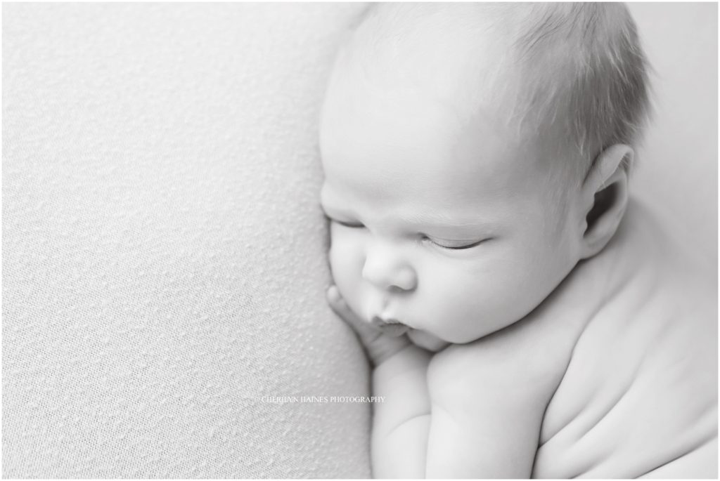 black and white portrait of newborn session in baton rouge, louisiana with cherilyn haines photography; portrait of 10 day old newborn baby boy