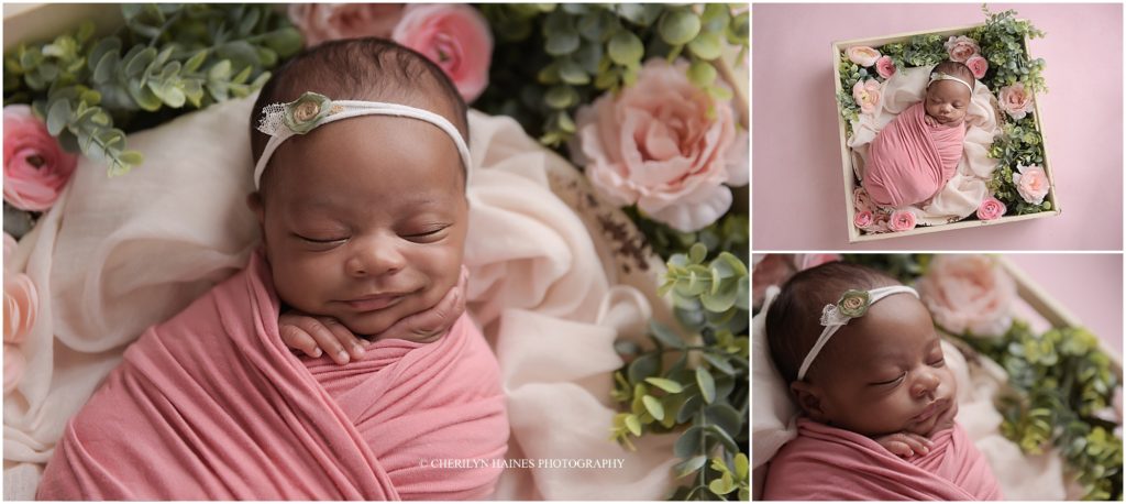 smiling newborn portraits with pink floral accents