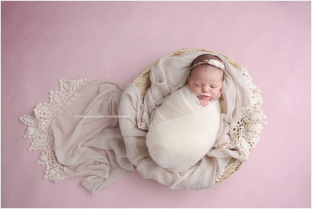 pink and antique white newborn setup for 14 day old baby girl photographed by cherilyn haines photography in new orleans, louisiana