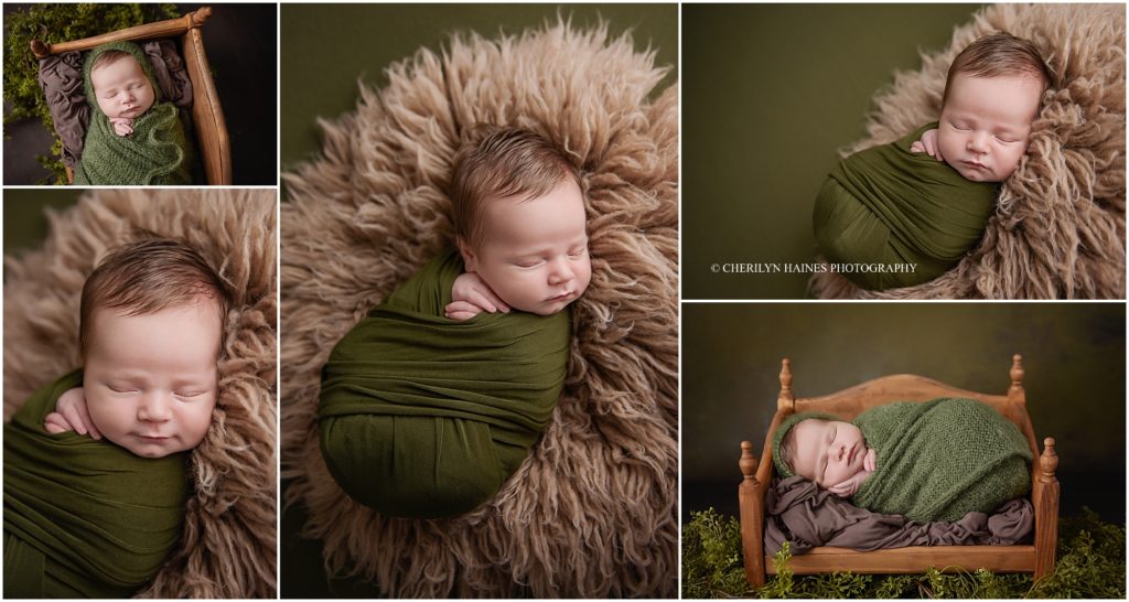 this 14 day old newborn baby boy had his newborn portrait session in Cherilyn haines photography's studio that services the baton rouge and surrounding louisiana and mississippi areas; the session was styled with dark greens and browns and baby was swaddled on a brown fur and posed in an antique doll bed.
