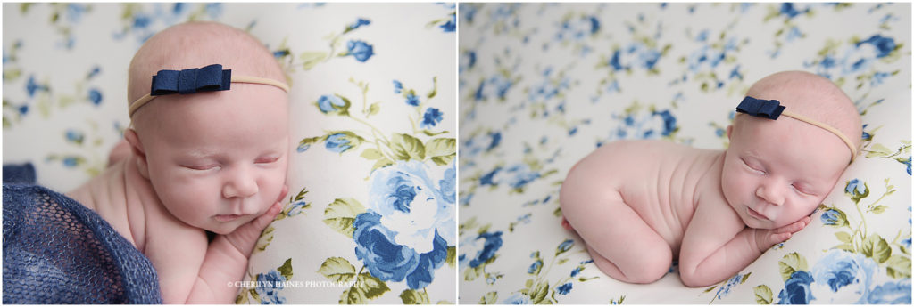 newborn session in baton rouge; baby posed on blue floral fabric