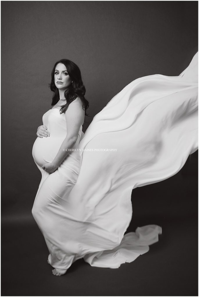 fine art black and white maternity portrait taken by cherilyn haines photography in her baton rouge, louisiana studio; cherilyn haines services the areas including baton rouge, denham springs, new orleans, lafayette, lake charles, and houston