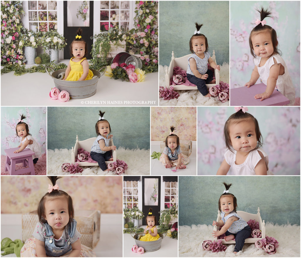 6 month old baby girl is photographed by Cherilyn Haines Photography at her Baton Rouge, Louisiana studio. Baby girl is wearing a yellow dress and photographed on a backdrop with a Flower Shop storefront and hundreds of flowers. 6 month old baby girl with a high ponytail is photographed in a white dress on a floral backdrop and on a tiny antique white daybed.