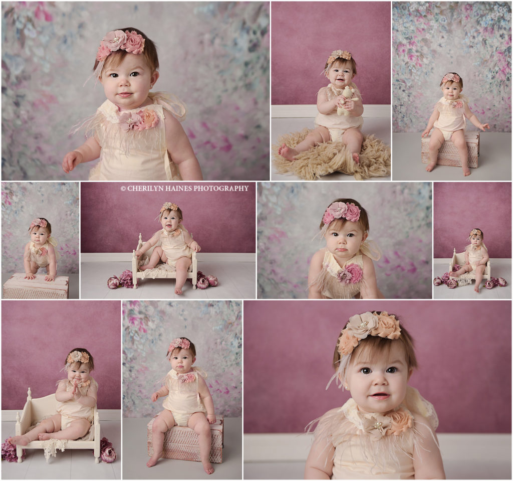 baby girl is photographed at her one year old portrait session with cherilyn haines photography in baton rouge, louisiana. This baby is wearing a boho style cream colored romper with flowers and a matching floral headband. She is photographed on a wine colored backdrop as well as a cool neutral backdrop with pink and blue florals. Cherilyn photographs babies from newborn age to 1 year old in the Denham Springs, Walker, Hammond, Lake Charles, Lafayette, and New Orleans areas.