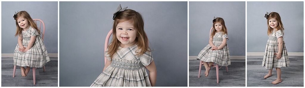 Big sister is photographed during her baby brother's 6 month session with Cherilyn Haines Photography