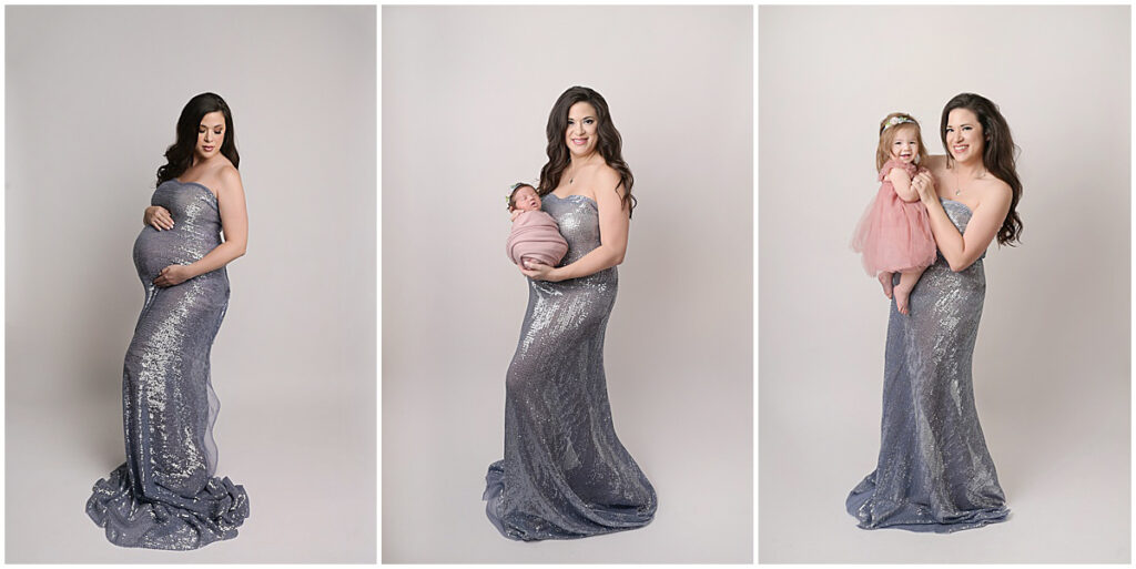 pregnant mama is photographed in a blue sequin gown, holding her newborn in the same gown, and holding her 1 year old in the same gown