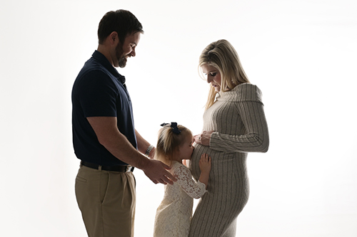 Silhouette family maternity portrait of pregnant mother in Baton Rouge studio