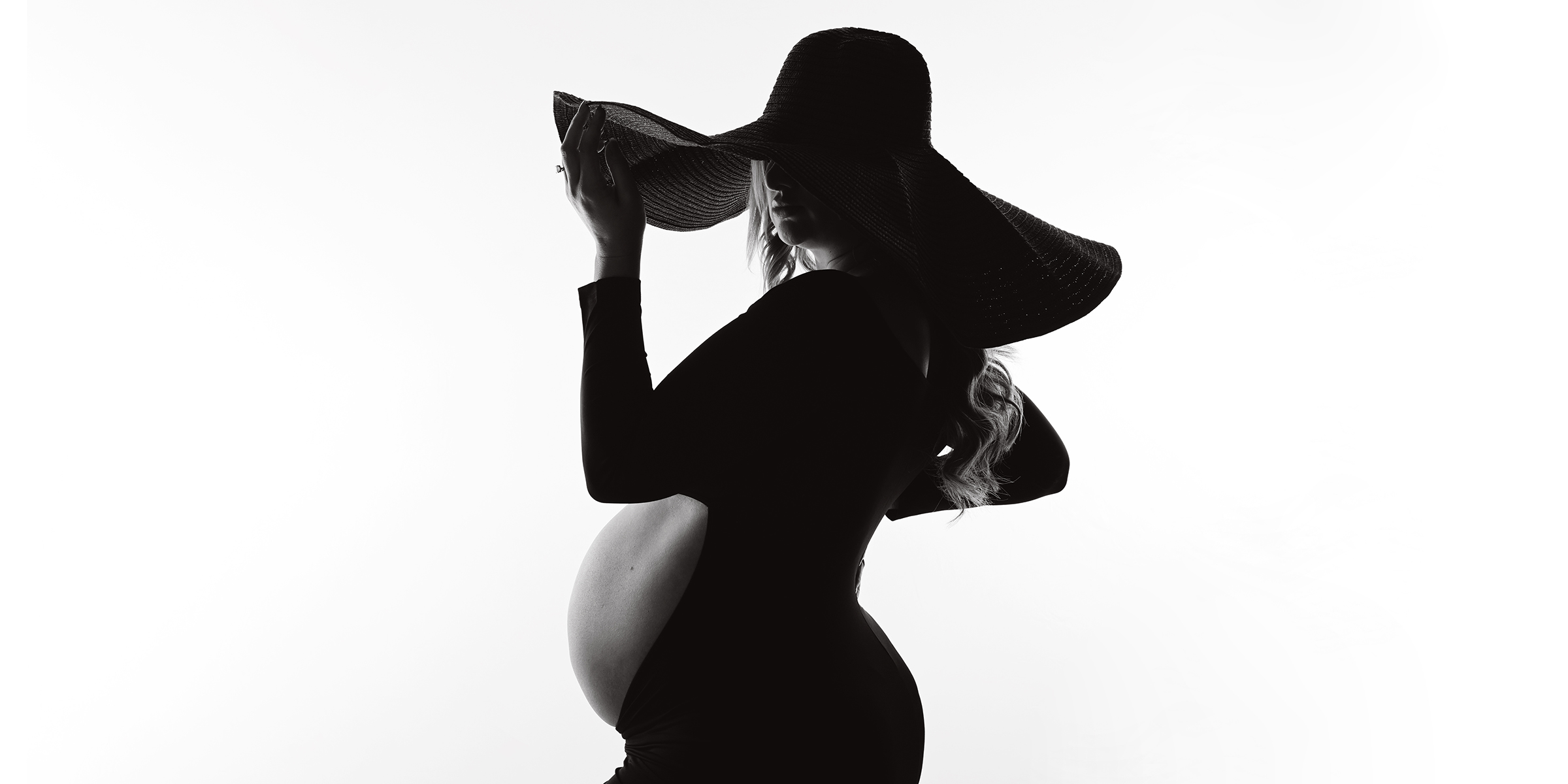 black and white silhouette maternity portrait with Cherilyn Haines Photography