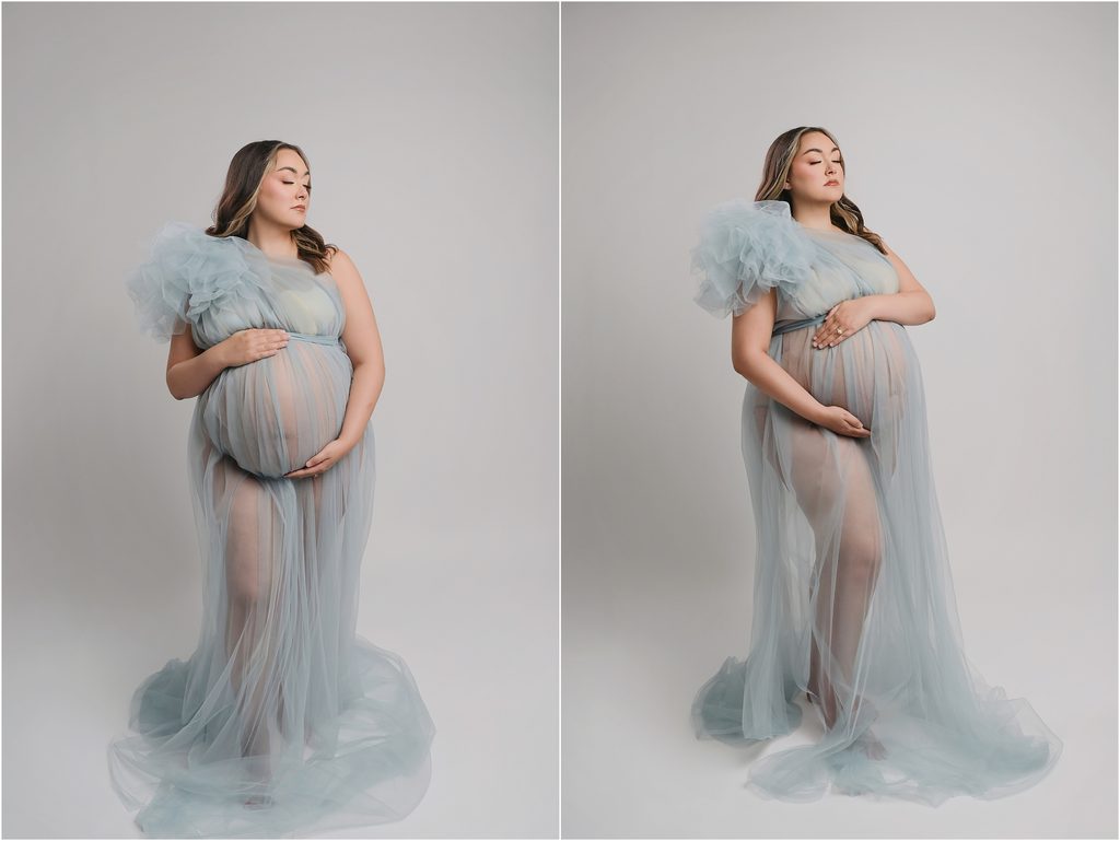 Pregnant mom wearing a dramatic light blue tulle maternity gown with a one-shoulder sleeve