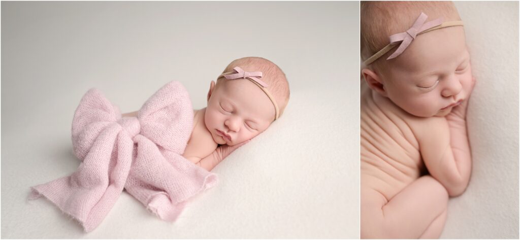 Newborn baby girl posed with a large pink bow