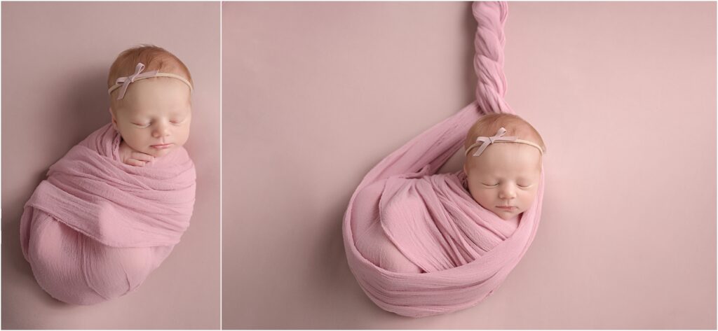 Newborn baby girl peacefully swaddled in pink on a matching pink blanket