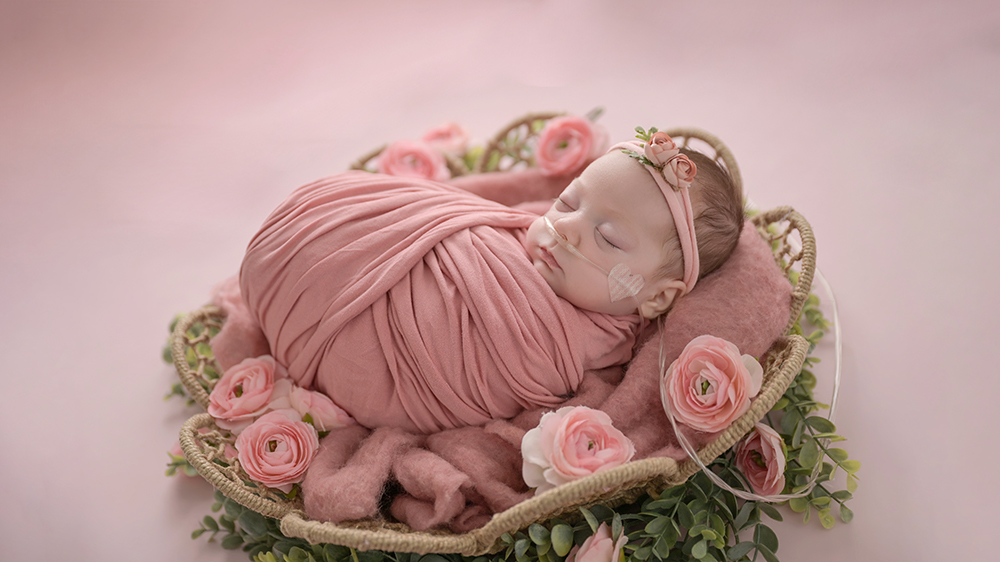Presleigh: A Little Fighter’s Newborn Session in Baton Rouge
